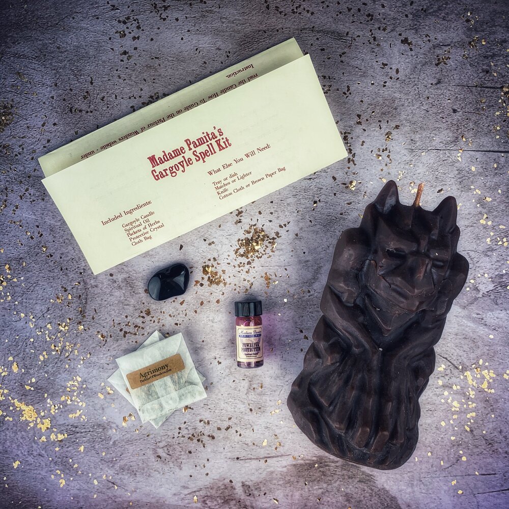 Beeswax Gargoyle Guardian Spell Candle with ritual components for protection magic